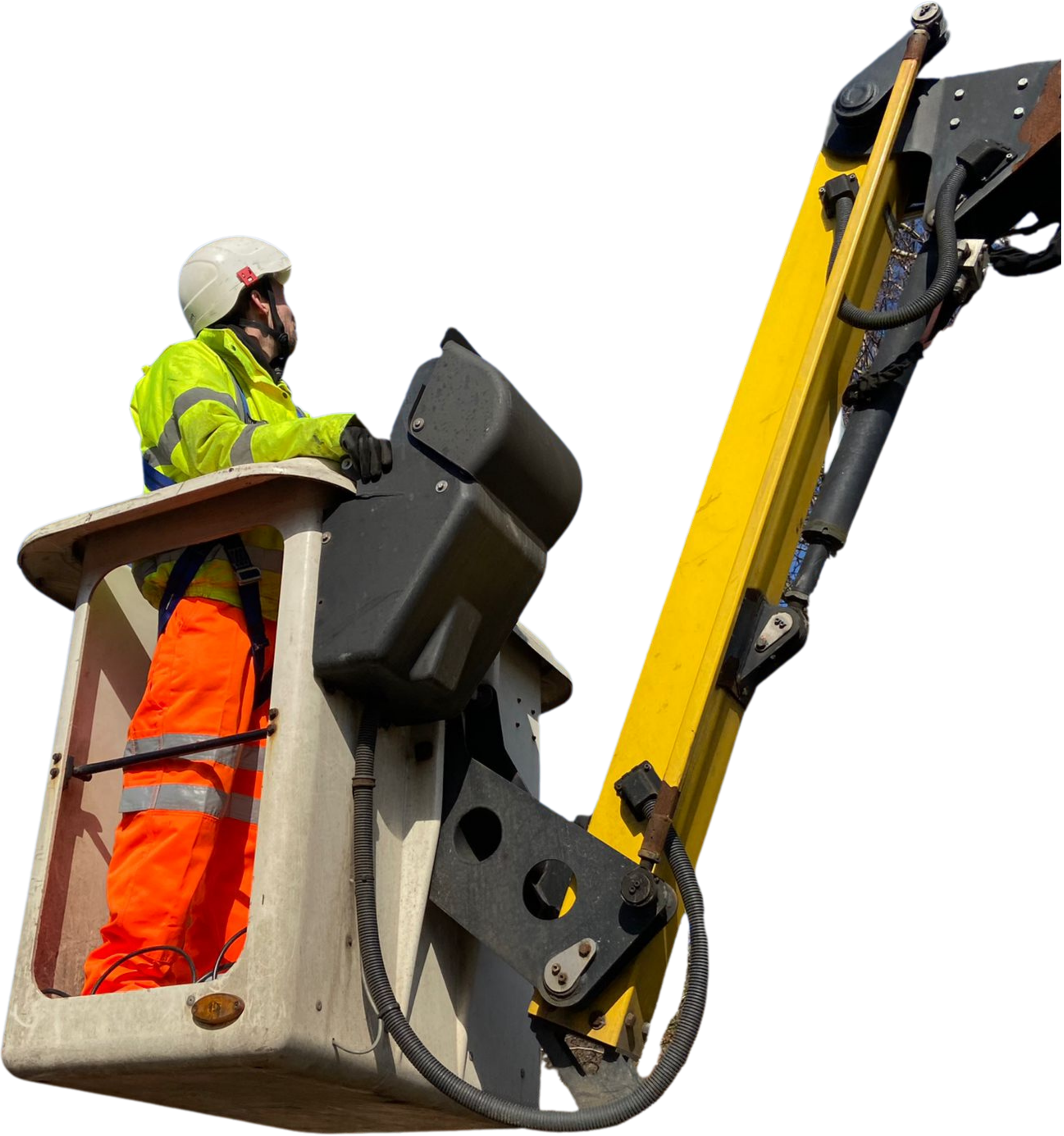A white male in a yellow high vis jacket, orange high vis trousers and a white hard hat is in a white and yellow cherry picker going up.